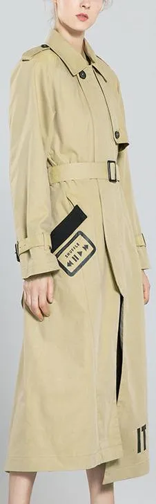 'It Turns Me On' Printed Trench Coat